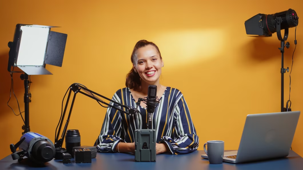 Influencer with video equipment in her studio