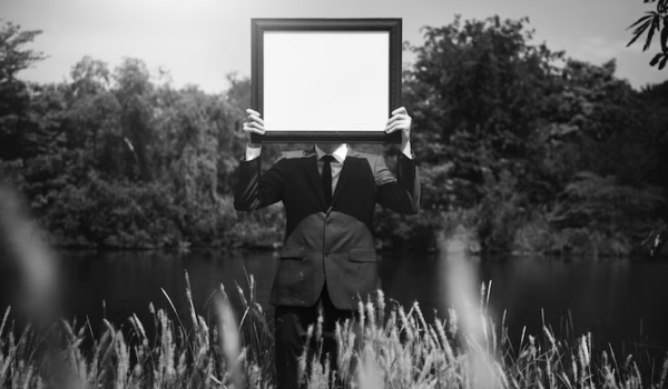 Surreal Photo: Man with a Picture in the Field